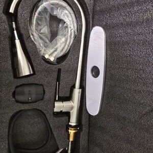 STAINLESS STEEL KITCHEN FAUCET. NEW